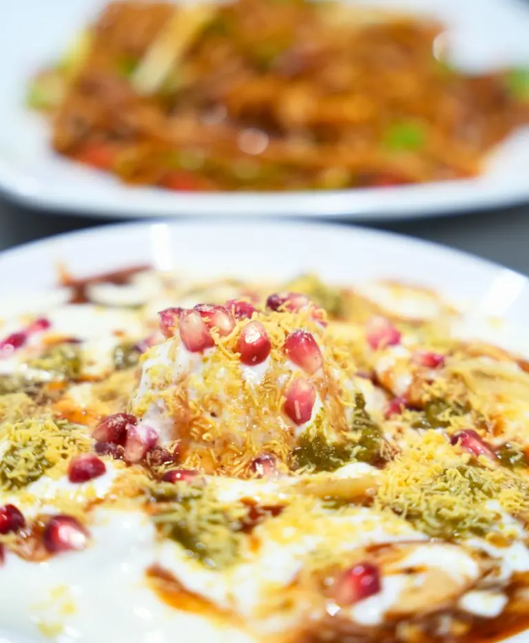 Dahi Bhalla Chaat dish prepared by Yummy Temptations Indian restaurants in Mississauga.