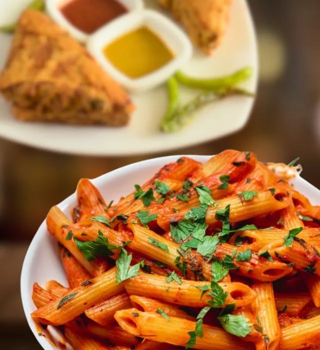 Red Sauce Pasta and Bread Pakora prepared by Yummy Temptations Indian restaurants in Mississauga.